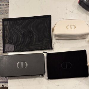 Christian Dior Black and White Pouch Set as well as Dior Black Zippered Case